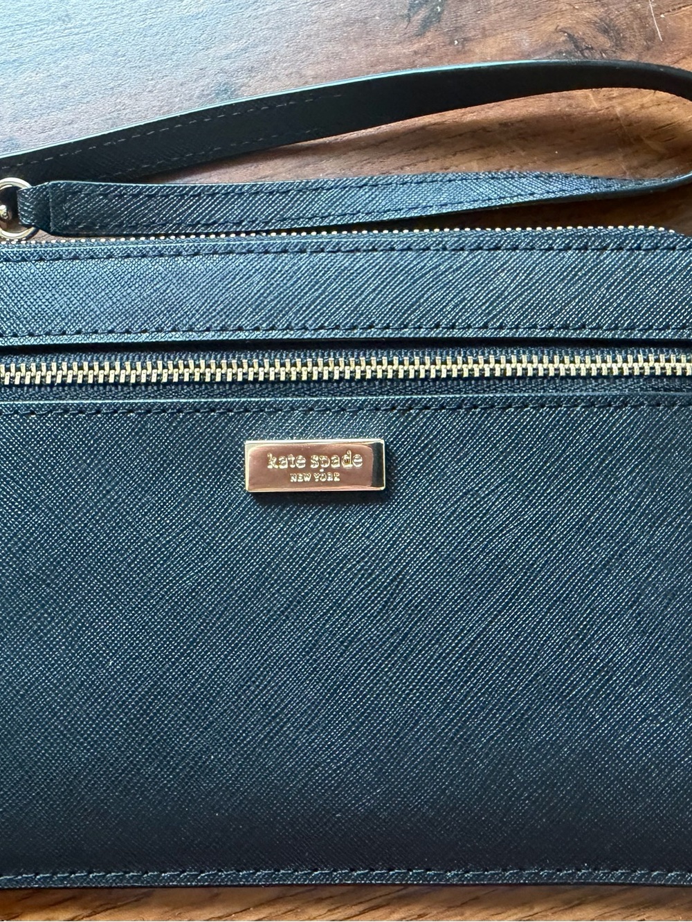 kate spade navy saffiano wristlet with gold hardware